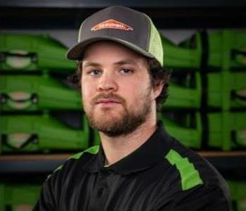 Male with SERVPRO hat and polo